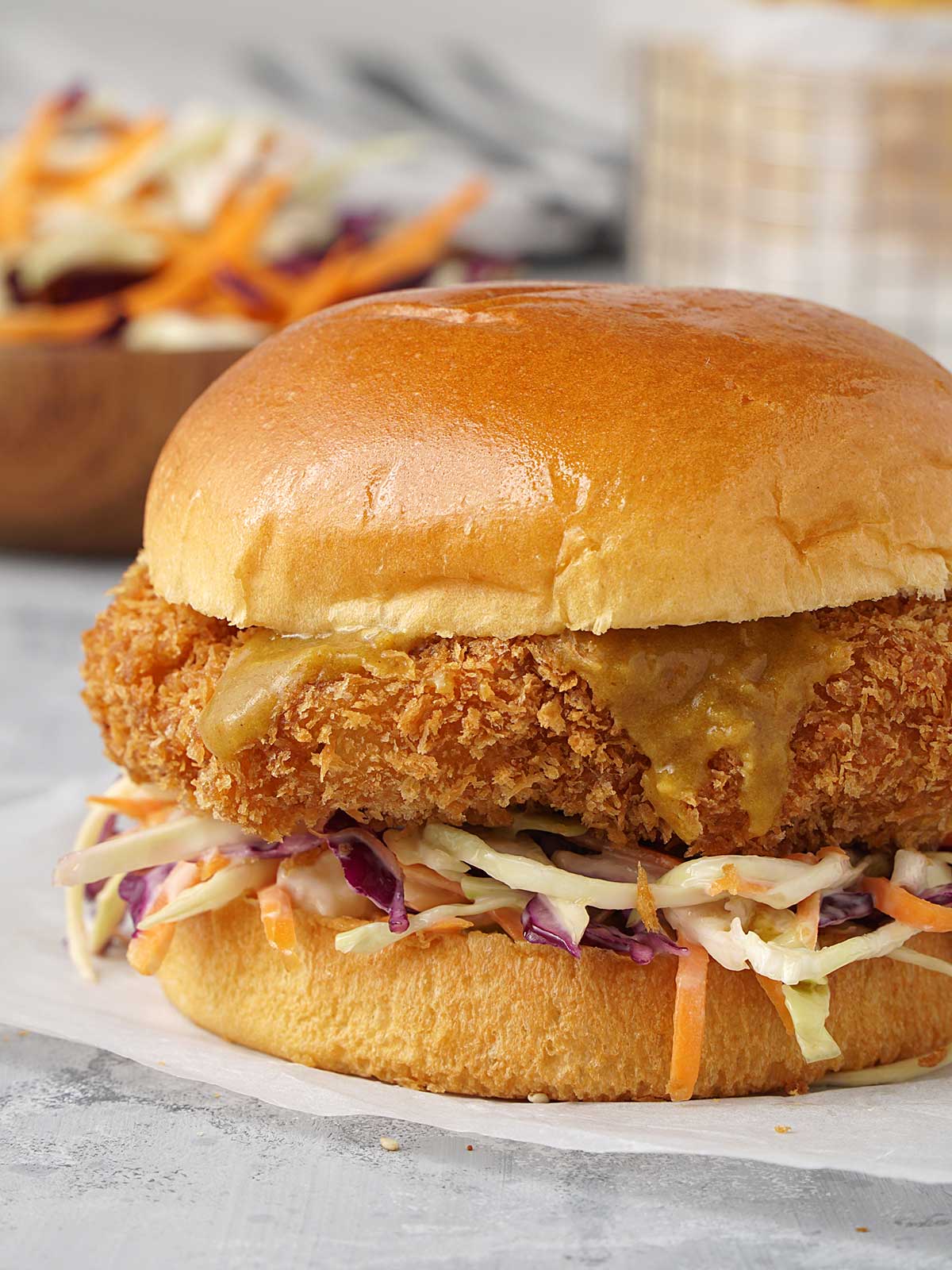 close up view of japanese katsu chicken burger