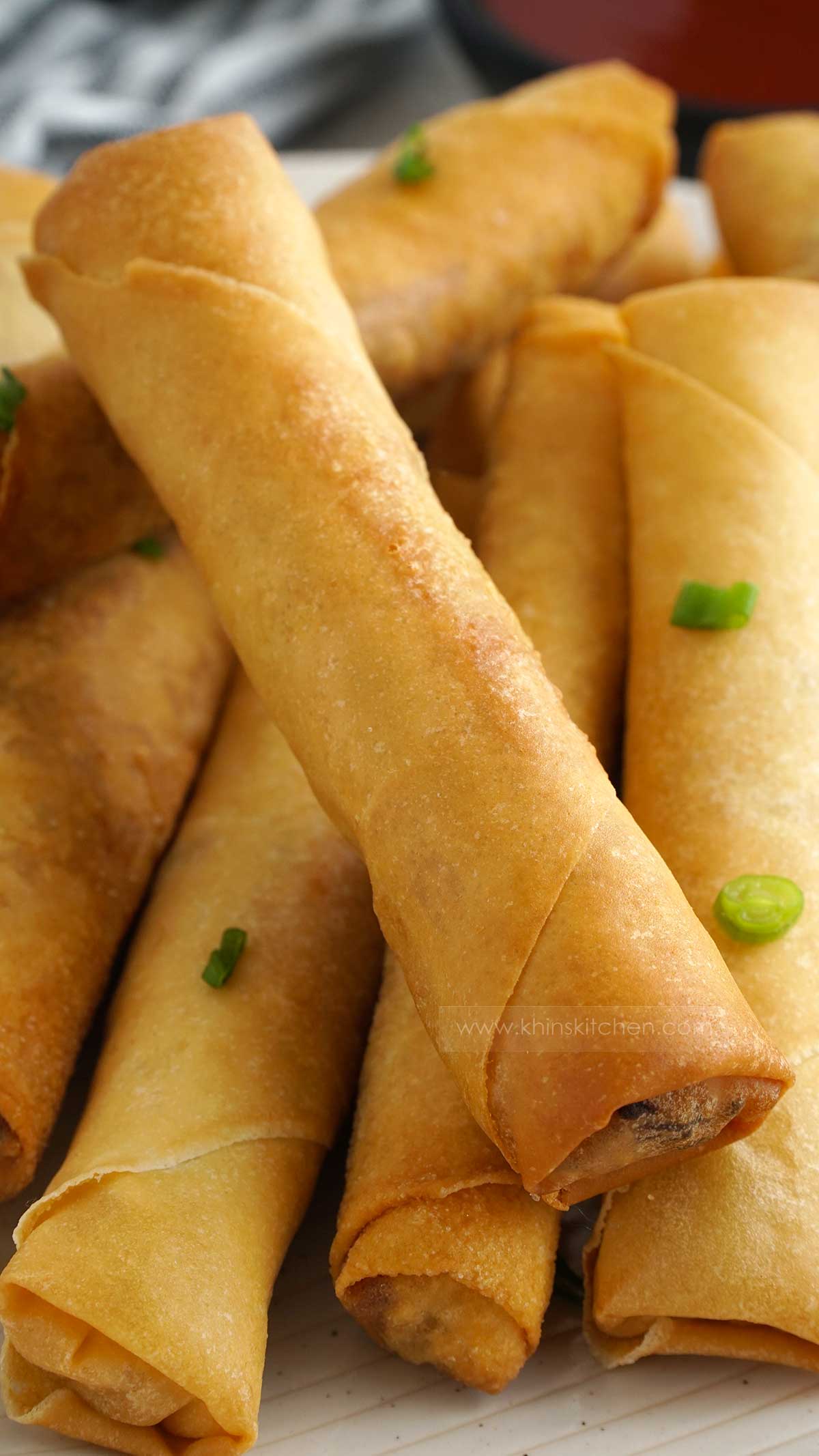 prawn spring rolls on the white plate.