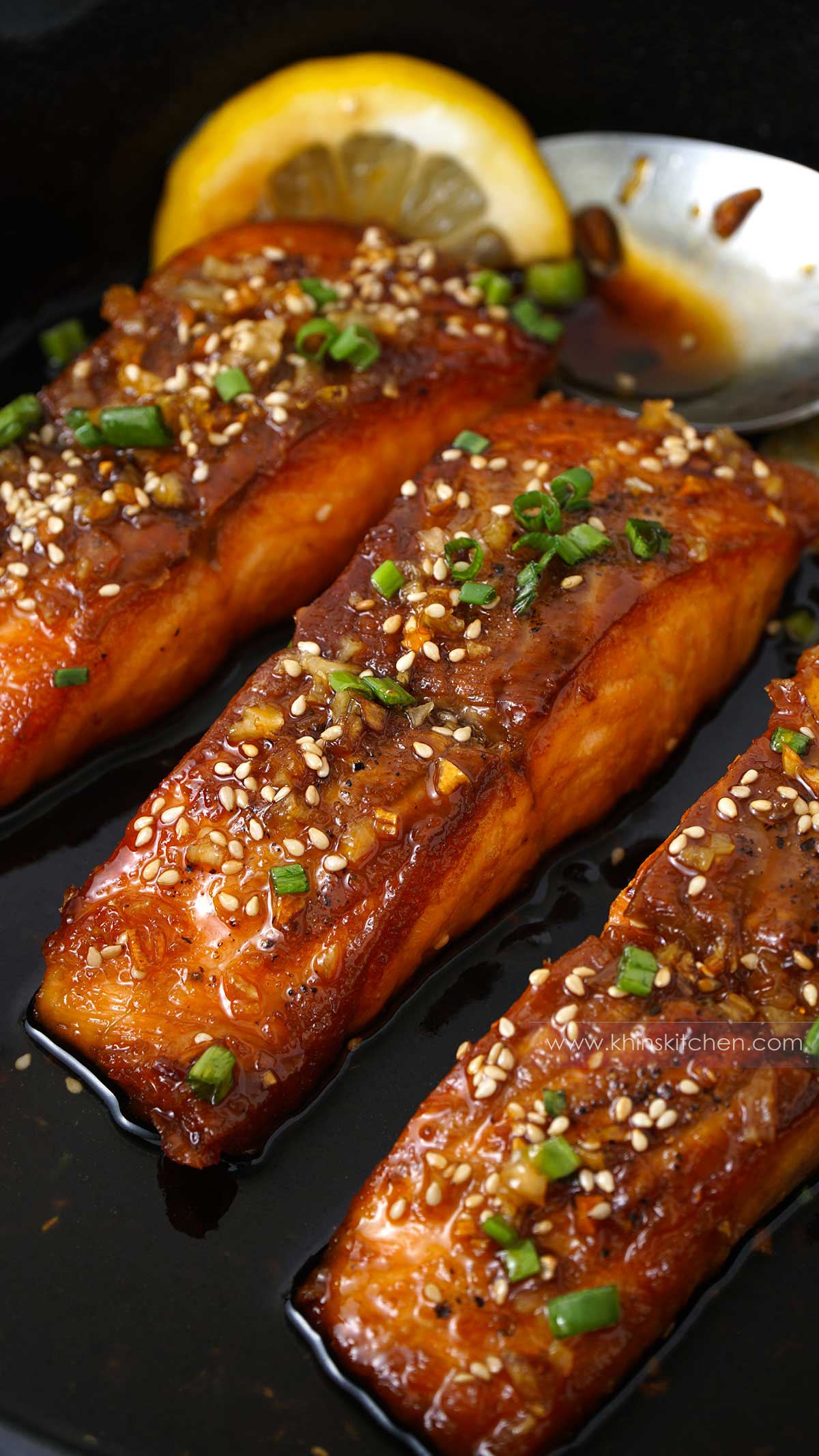 A skillet filled with honey garlic salmon.