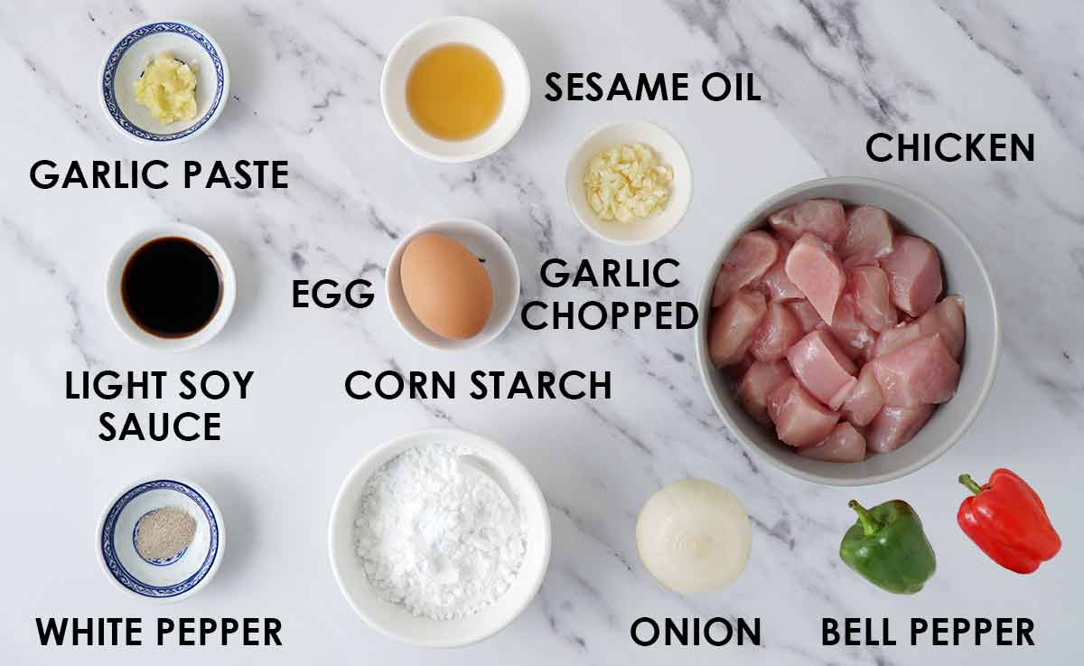 Labelled sweet and sour chicken marinade and coating ingredients.