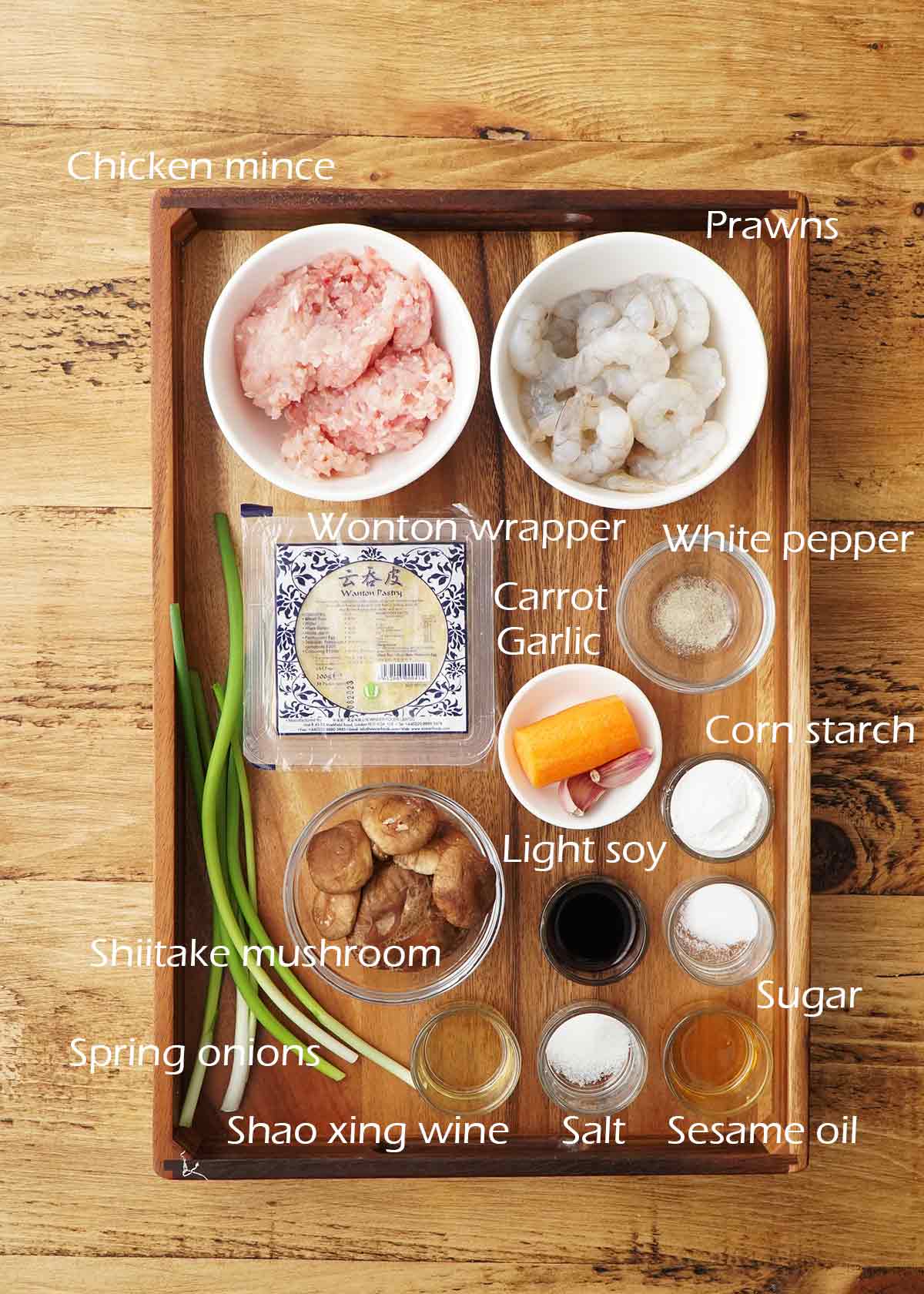 Labelled ingredients of making Chinese prawn and chicken dumplings.