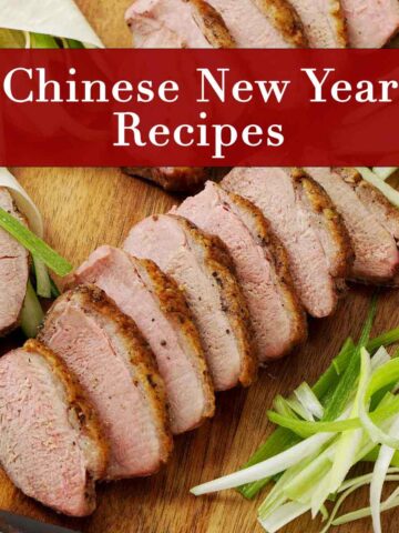 An image of a roasted duck slices, labelled, Chinese new year recipes.
