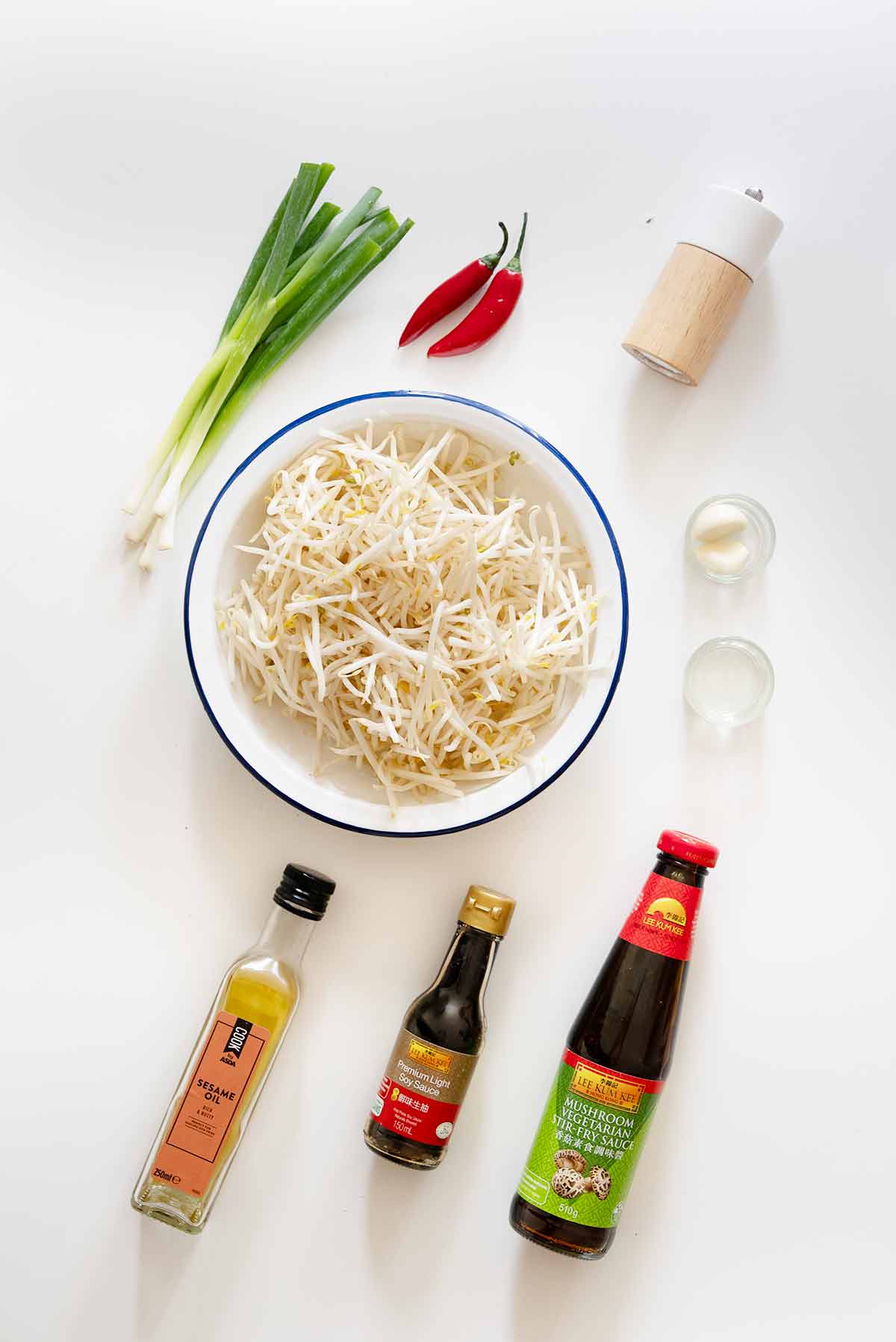 Labelled ingredients displayed on the white table.