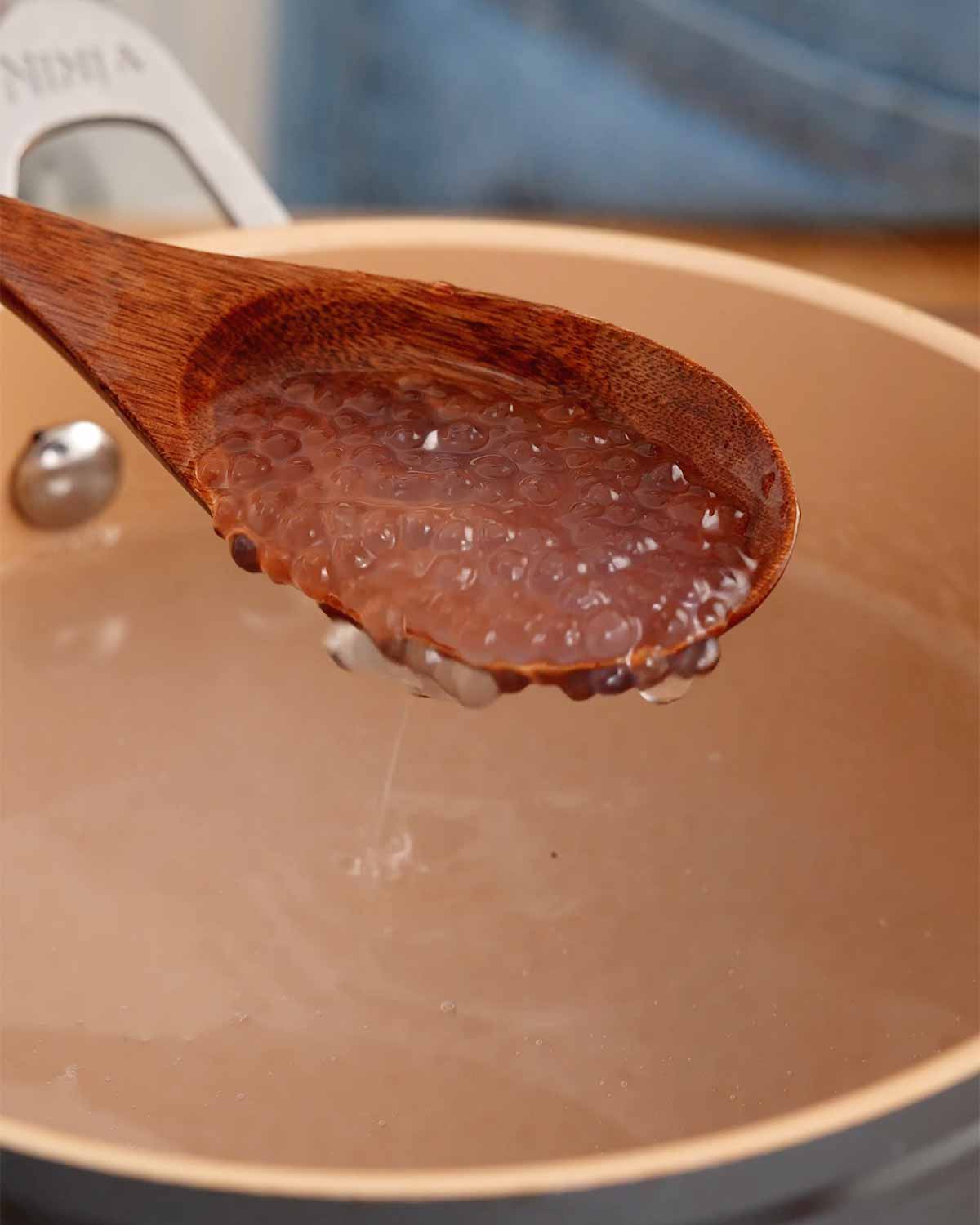 An image showing how to boil sago until translucent.