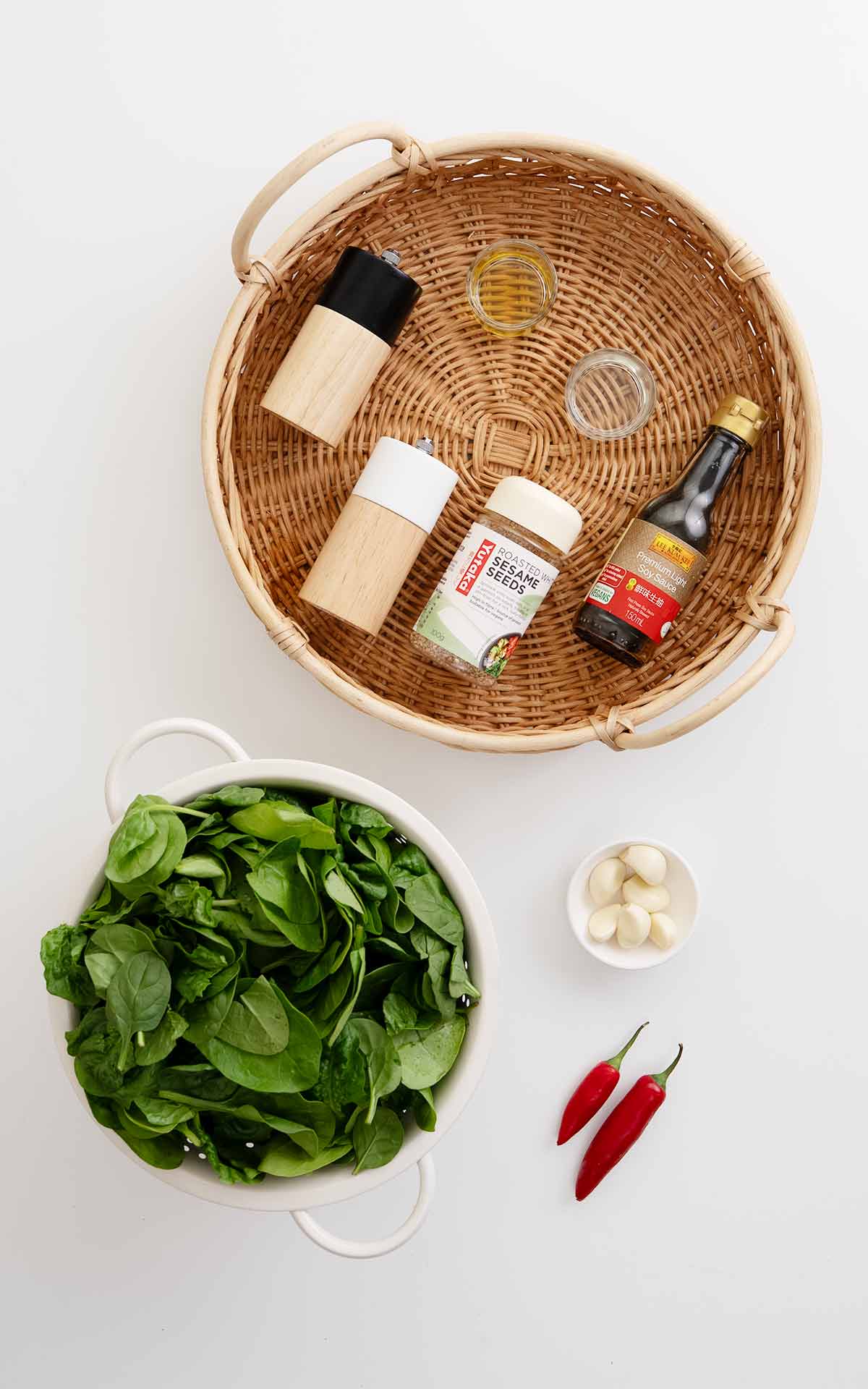 Labelled ingredients displayed on the white table.